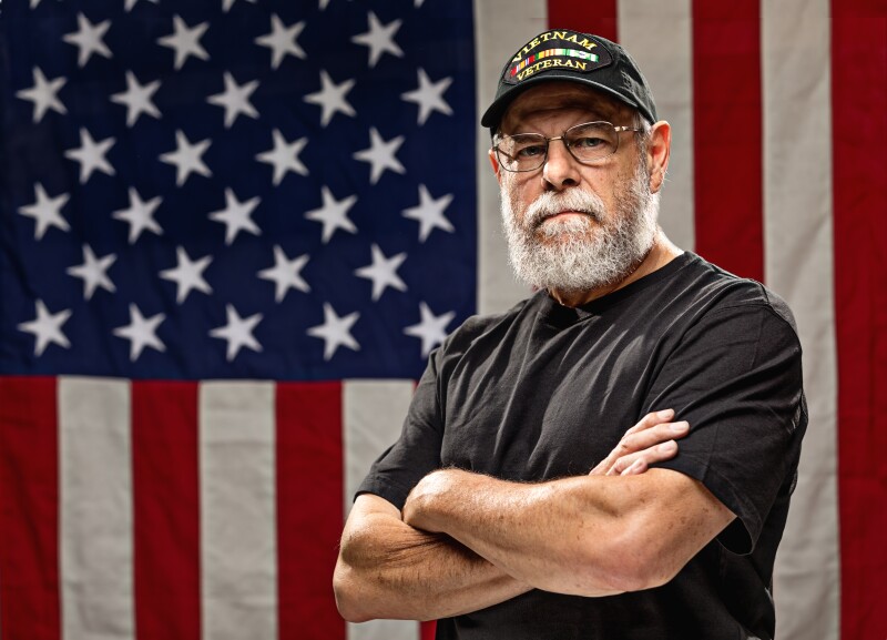 Authentic Vietnam Veteran with American Flag