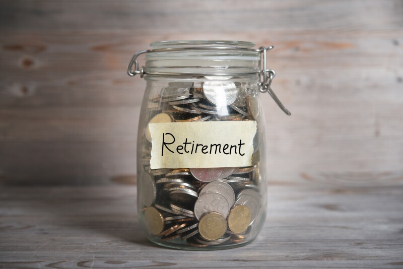 Money jar with retirement label.