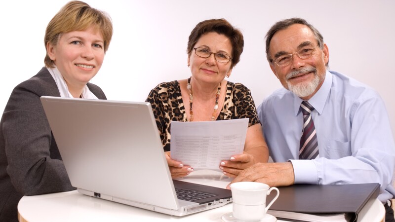 Mature couple talking to daughter