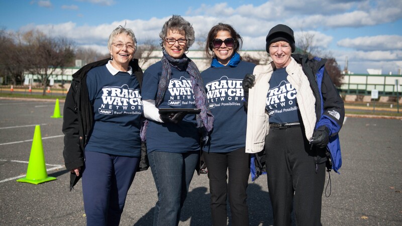 A group of Fraud Watch Network volunteers