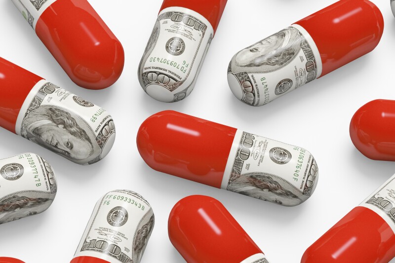 Pills decorated with dollar bills
