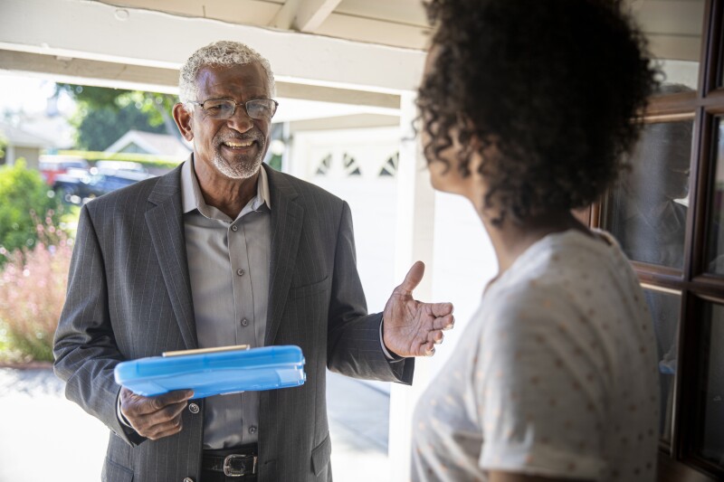 Senior Black Politician Door to Door
