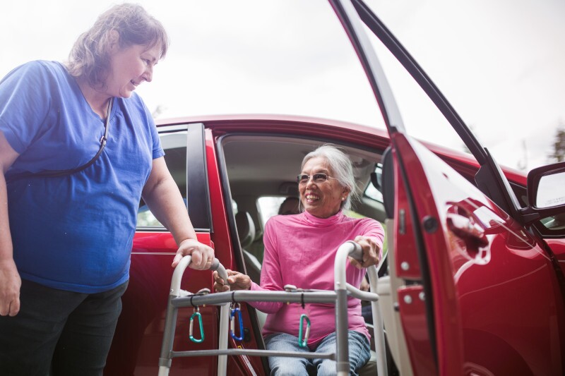 Disabled Senior Woman Getting a Ride