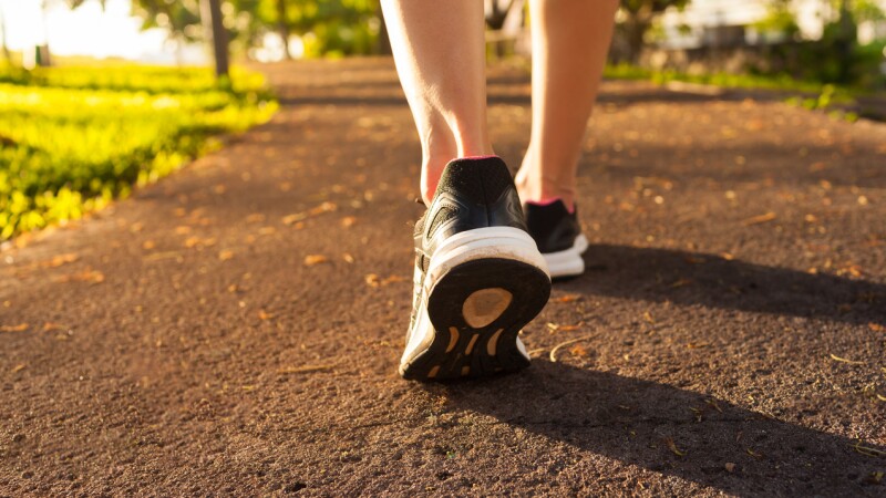 Woman walking on a path