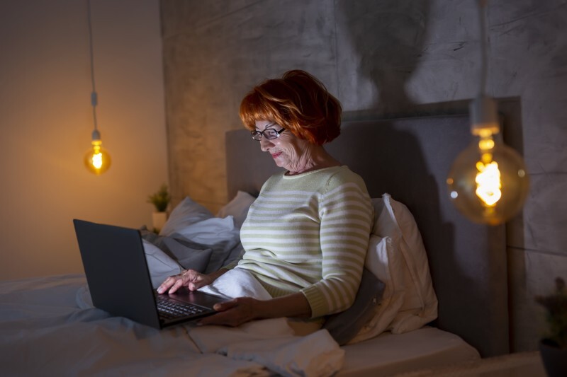 iStock - vladans - woman movies laptop.jpg