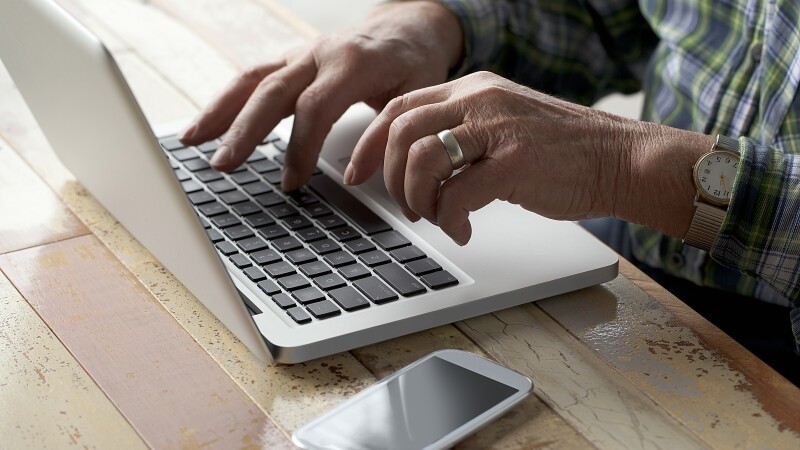 Senior Male with Technology