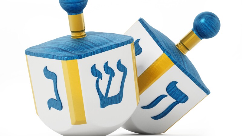 Hanukkah dreidels isolated on white