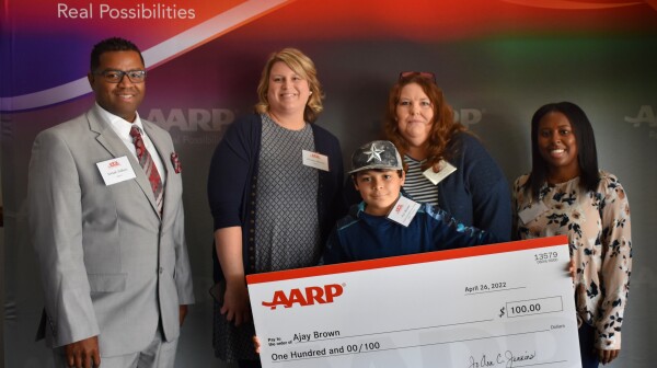 Essay winner family with Teacher and Principal