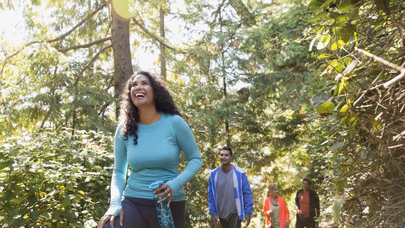 Family hiking in woods