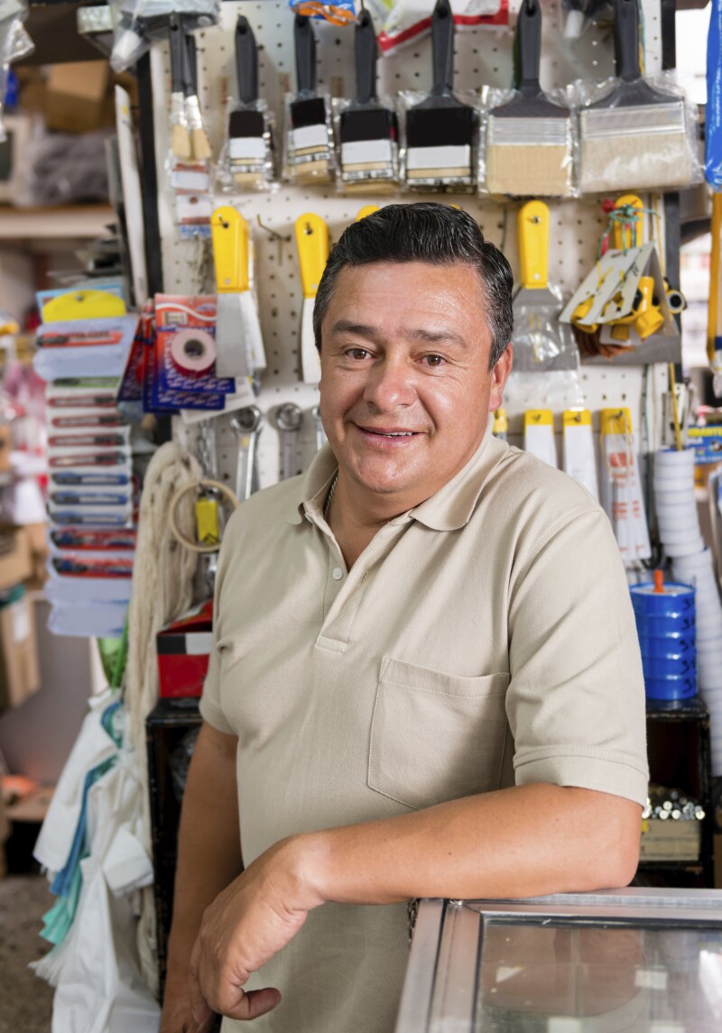 Confident hardware store owner