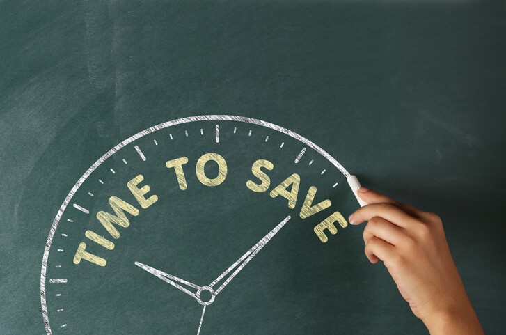 Hand writing Time to Save on Blackboard