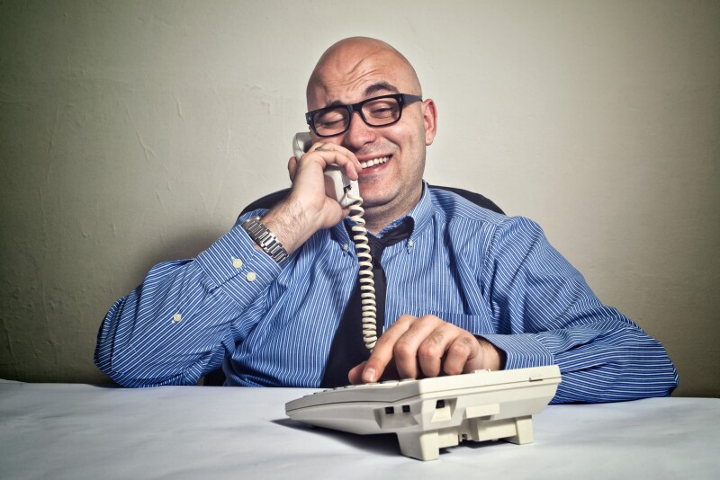 Businessman making suspicious call