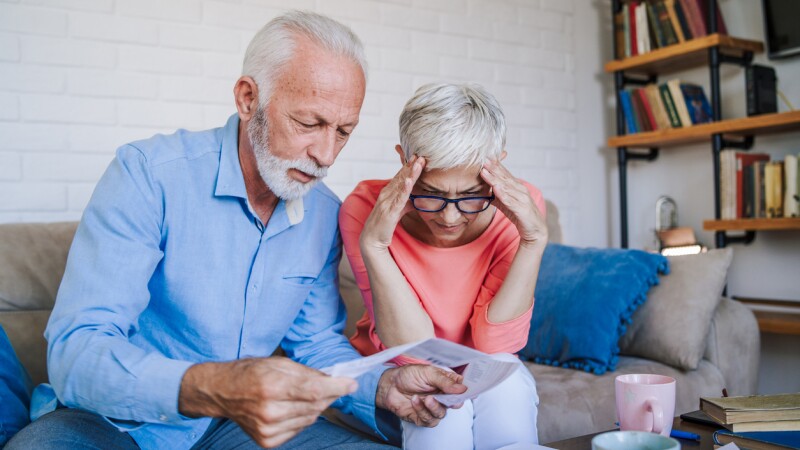 Senior couple having problems with home finances
