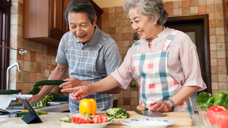 The old couple are in the kitchen