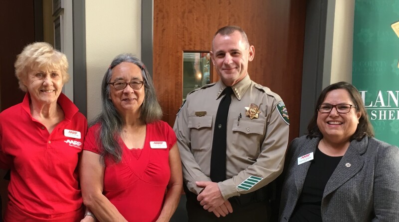 Charlott, Junko & Carmel with law enforcement.jpg