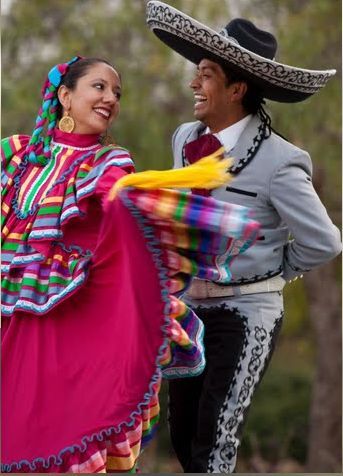 Mariachi band and dancer