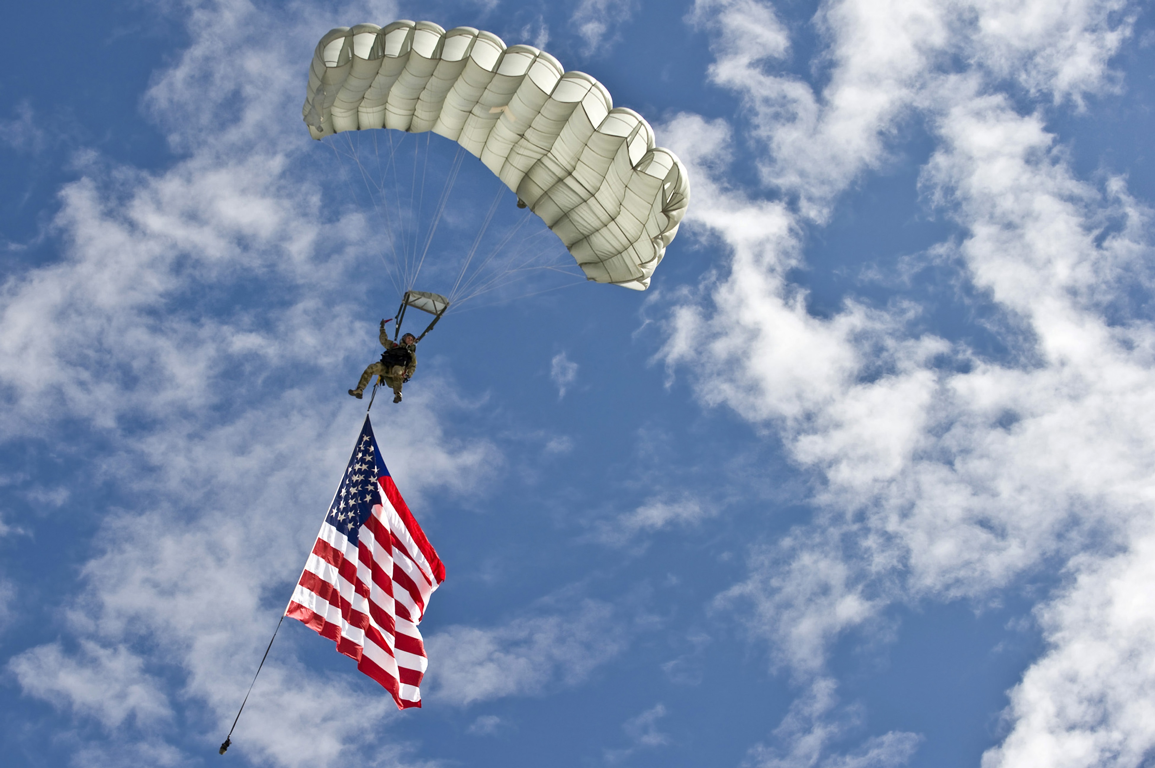 November 12, 2011 - A U.S. Air Force combat controller jumps with the American flag during the 2011 Aviation Nation Open House at Nellis Air Force Base, Nevada.