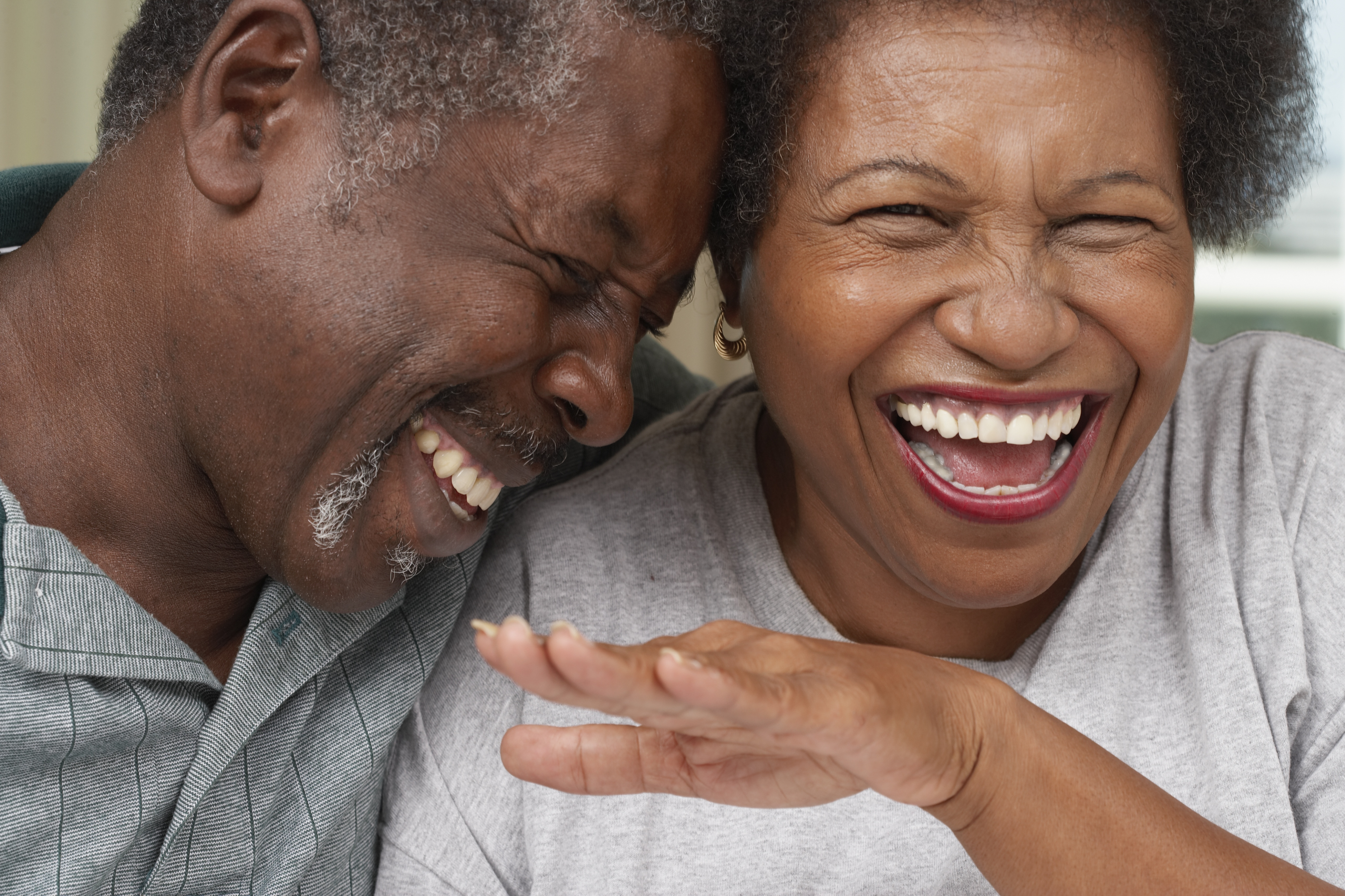 Close up of senior African American couple laughing