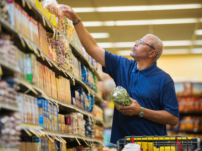 African American man shopping in grocery store