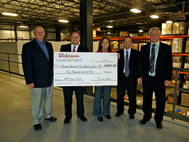 AARP's new Executive Council member Carl Pagles joins AARP officials for a presentation at the Second Harvest Food Bank of East Tennessee