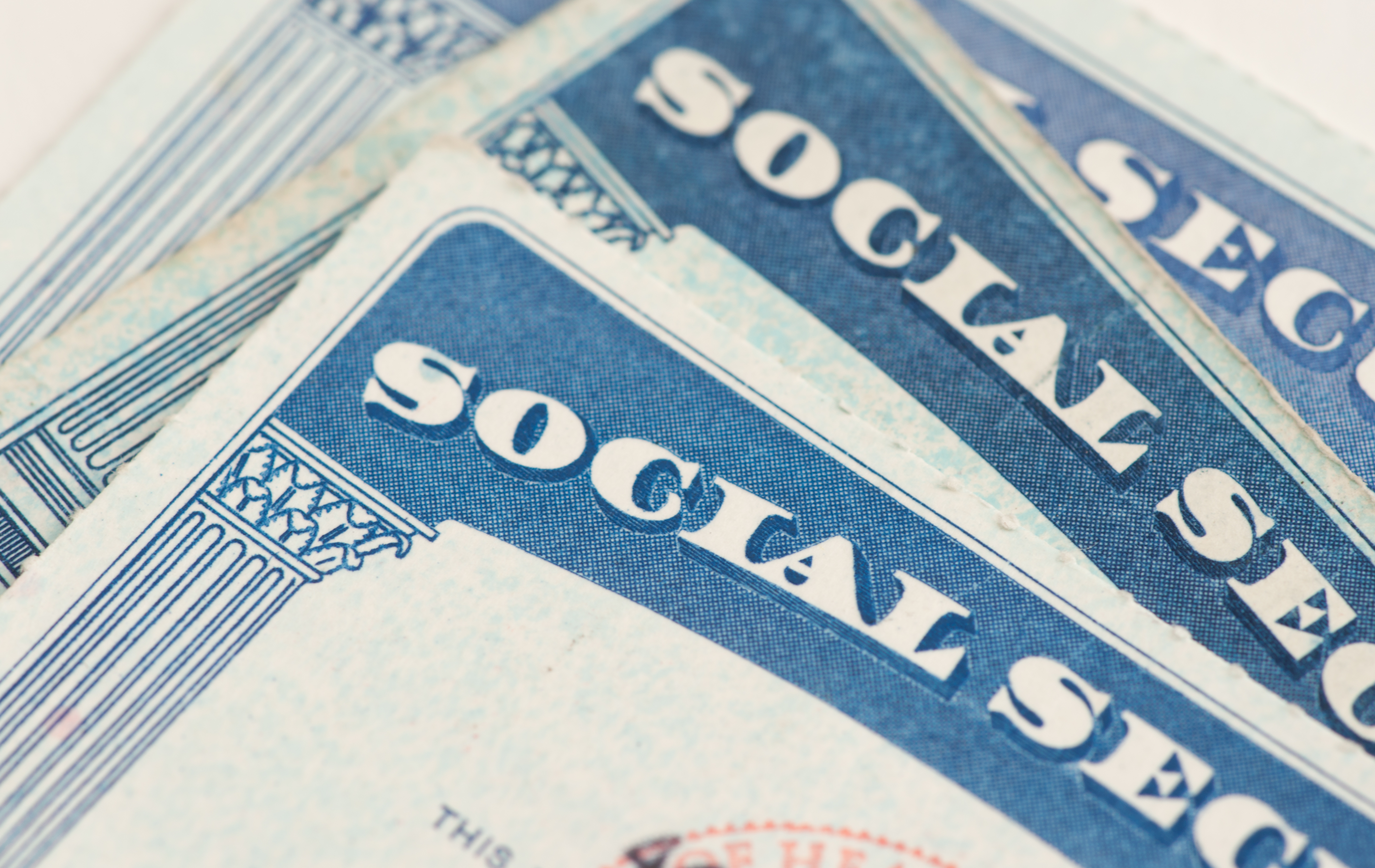 Close up of corner of several social security cards