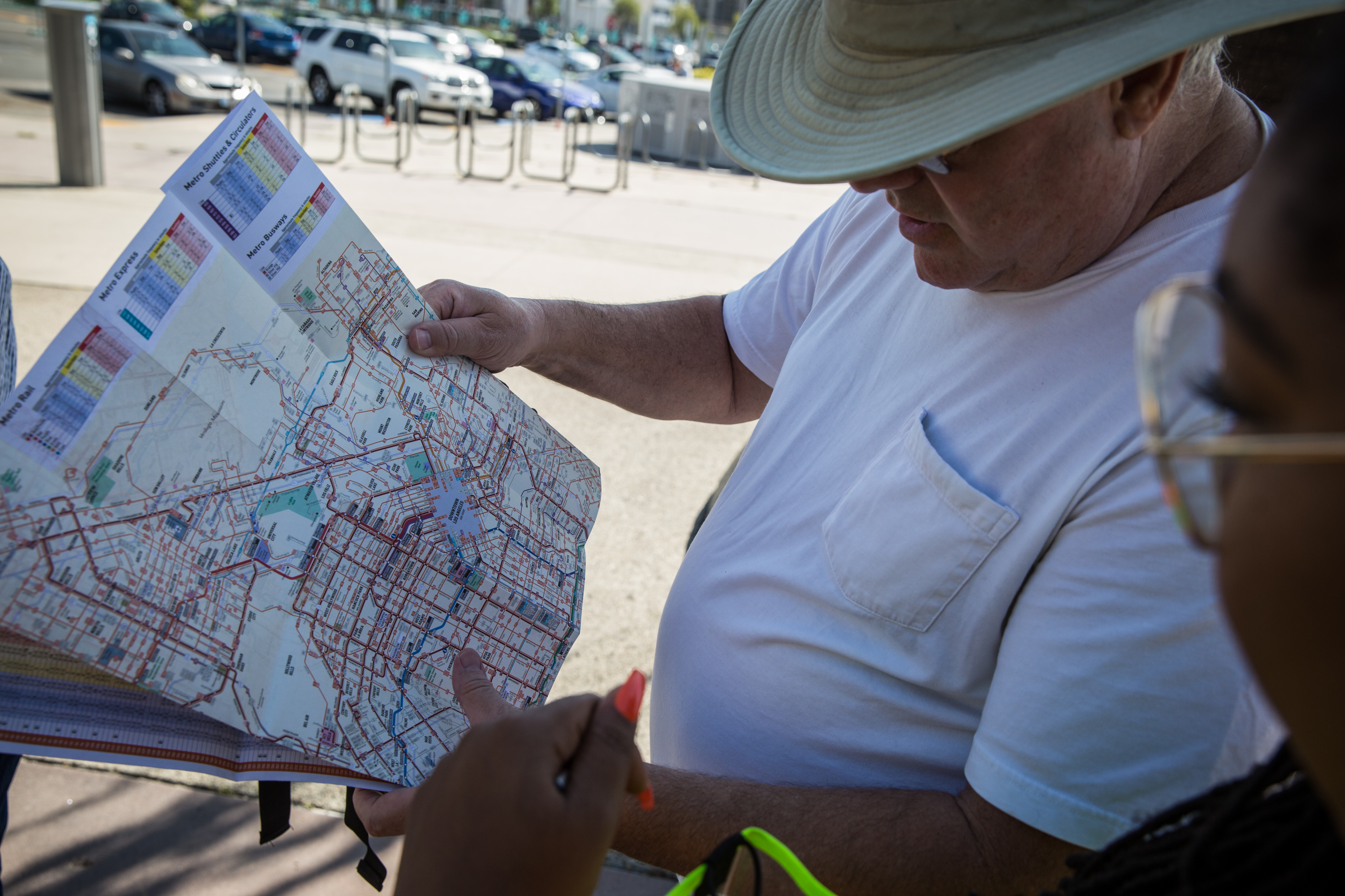 Man examining bus map