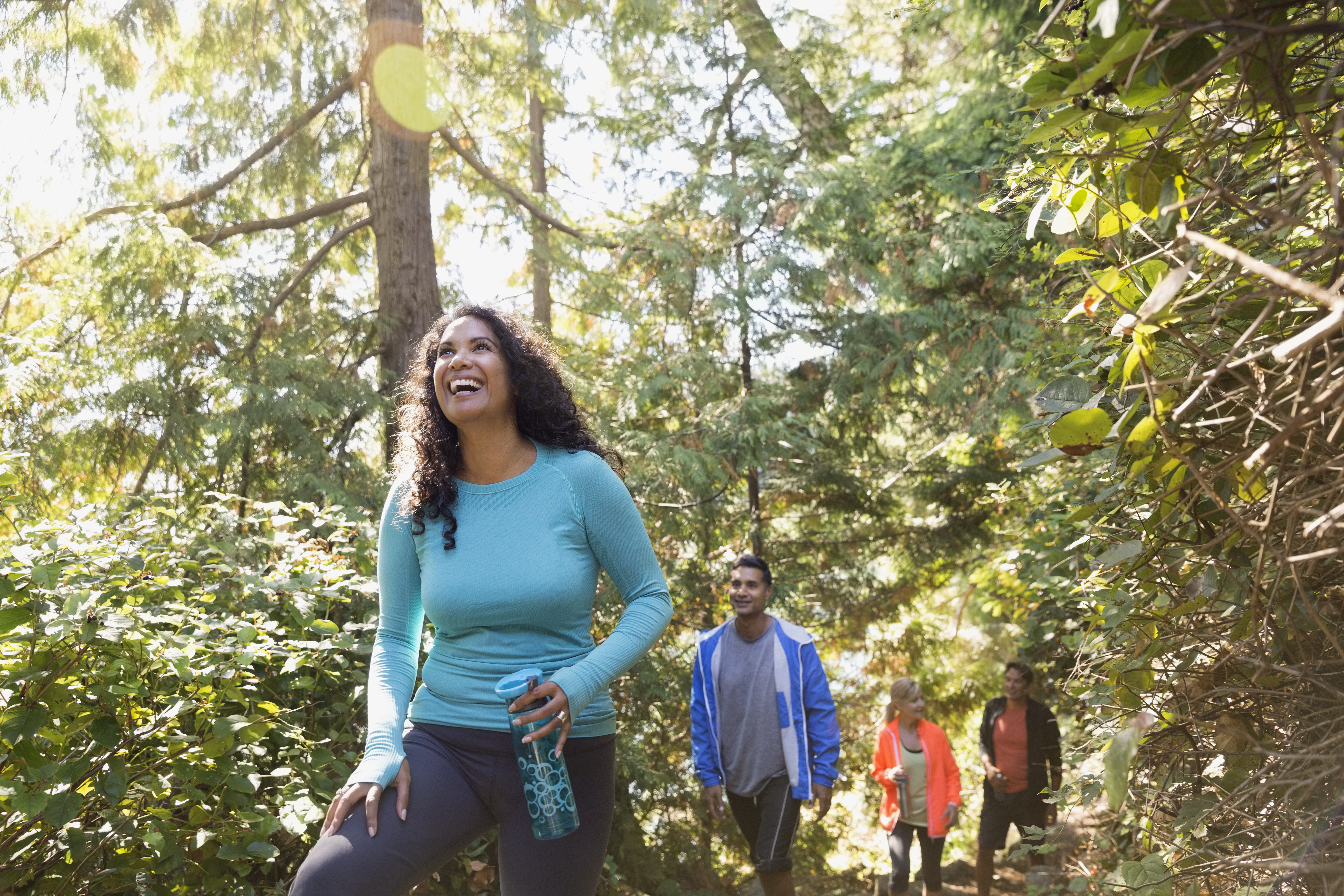 Family hiking in woods