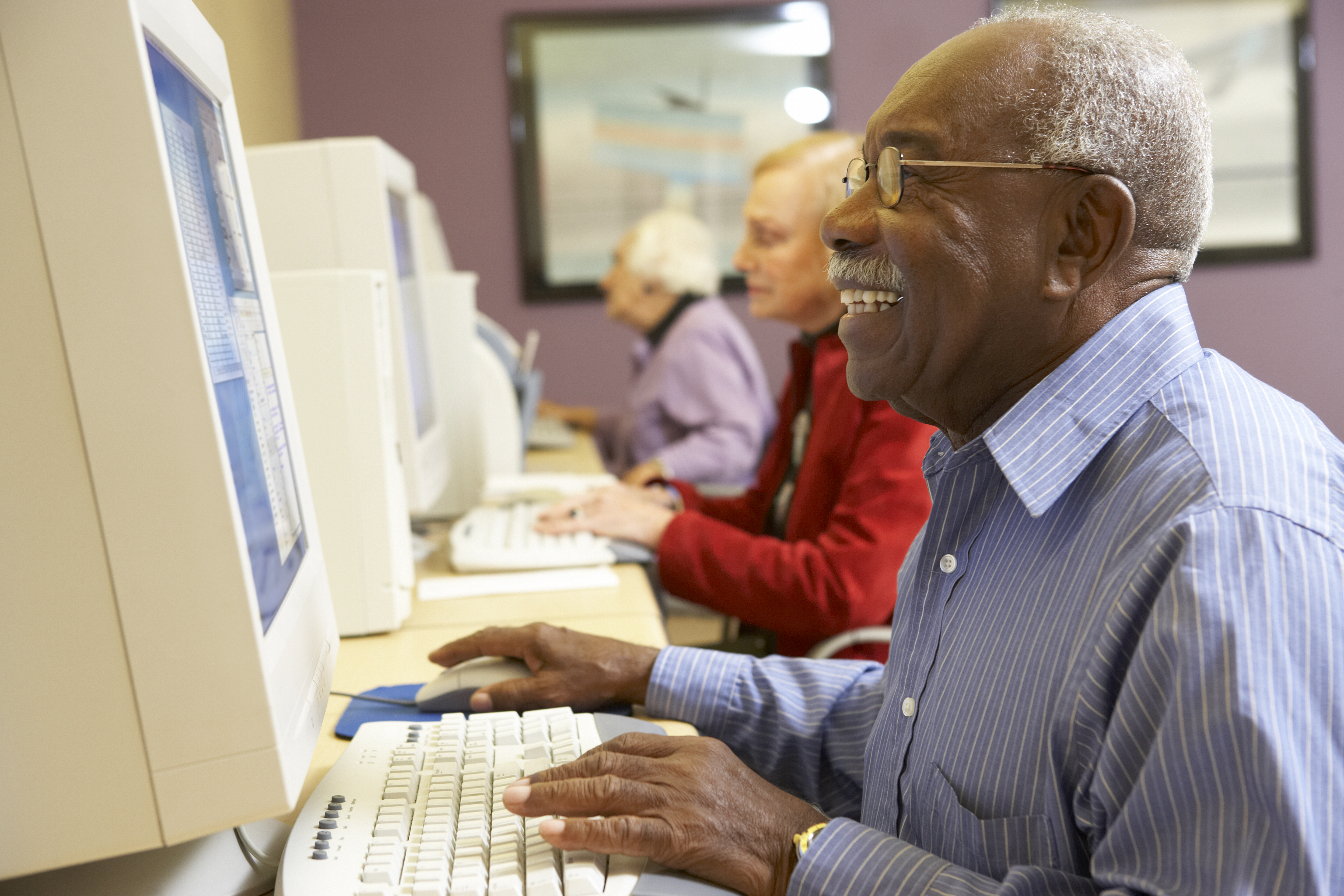 Senior man using computer